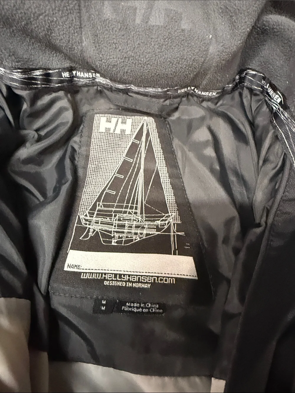 Helly Hansen Black Ski Jacket with Pink and White Accents